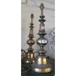 A pair of brass effect lamps