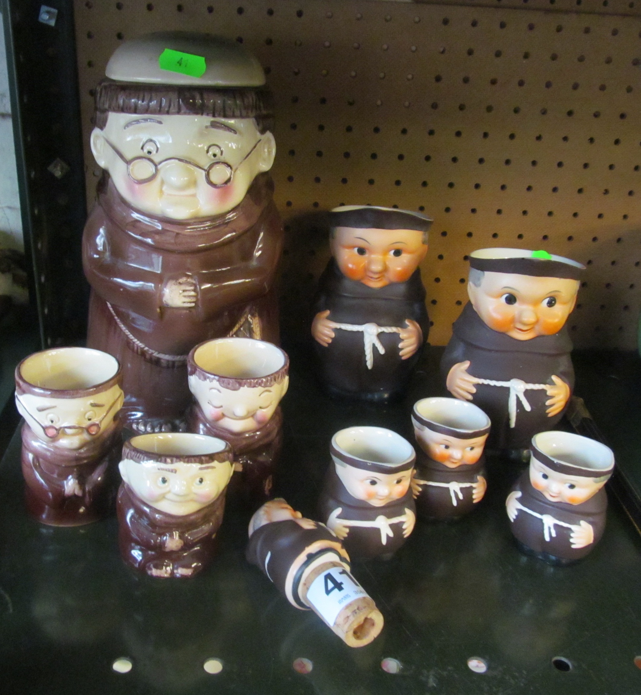 Five Goebel Monk mugs (one hairline crack), bottle stopper, four Weiss monks and two multi eggcup