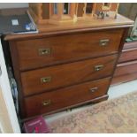 A mahogany chest three long drawers