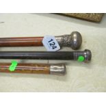 Three silver handled walking canes