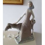A Lladro figure girl with goat