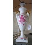 A Kaiser table lamp decorated pink flowers