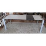 A Ciacci Kreaty modern extending dining table aluminium frame with three interleaf panels one