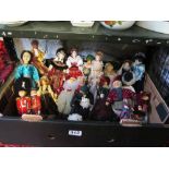 A box of tourist and costume dolls