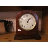 A Seth Thomas mahogany cased mantle clock with enamel dial 24cm high
