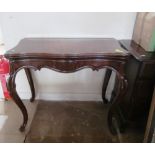 A Victorian mahogany tea table