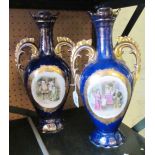 A pair of blue and gilt vases with reserves of scenes of Shylock and Falstaff