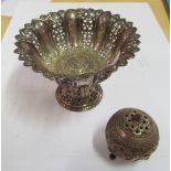An eastern white metal bowl with pierced and solid leaf design and a pepperette