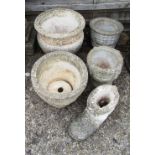 Four stoneware garden pots and a boot