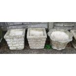 A pair of stoneware garden pots and a scallop edged pot