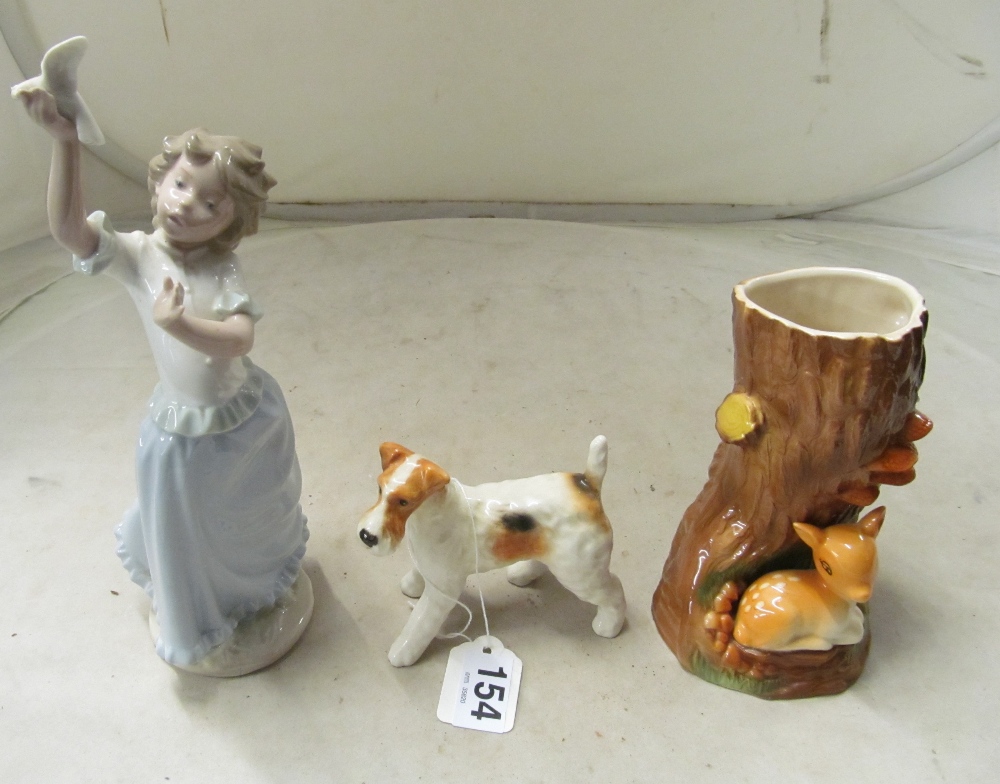 A Hornsea Fawn, Nao girl with dove and a Beswick dog