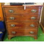 A small 19th Century chest of two deep drawers with dummy drawer fronts