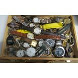 A group of watches in wooden case