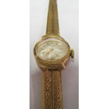 A 9ct gold ladies Nivada watch on gold strap 17.68g all in in blue case