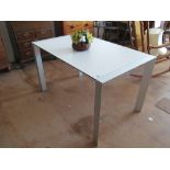 A Ciacci Kreaty modern extending dining table aluminium frame with three interleaf panels one