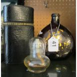 A hip flask in leather case, and antique bottle and glass night light