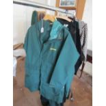 Two Phoenix green waterproof jackets and trouser sets