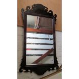 A mahogany fretted mirror