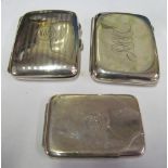 A silver cigarette case, another initialled (dented) and a small case 5.8 ozs