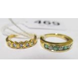 An 18ct gold seven stone ring marked 0.20ct and an 18k five stone ring