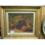 Farncombe - a pair of still lives fruit on ground signed and dated 1893 in gilt frames