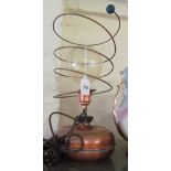 A lamp with copper base and twist copper wire surround