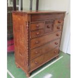 A 19th Century mahogany chest of drawers centre deep drawer and four small drawers over three long