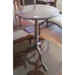 A 19th Century circular top tripod table