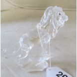 A Swarovski lion on stand