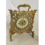 A freestanding brass clock