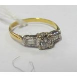 A small diamond ring with baguette shoulders size K/L