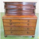 A William IV rosewood chest/chiffoniere of four drawers with chiffoniere back