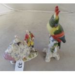 A Capodimonte parrot and porcelain group (a/f)