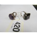 A white metal ring with Smokey quartz, another purple agate ring and loose gem stones