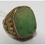 A gilt filigree and jade ring size N/O