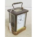 A brass cased carriage clock