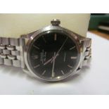A Rolex Air King stainless steel watch with black face model 5500 serial number 3454756 c1973 (