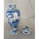 A baluster shaped lidded blue and white vase decorated geisha in garden seated at a table with '