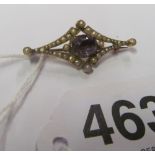 A 9ct gold brooch set amethyst and seed pearls