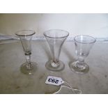 Five small old glasses