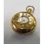 A small 18k gold half hunter pocket watch (inner cover metal), slight dent between 3 & 4