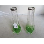 A pair of green and clear glass late Victorian vases with silver rims