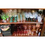 Various coloured glass drinking glasses, two scent bottles et cetera