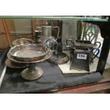 A three piece silver plated coffee set and other plated items