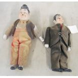 A pair of Laurel & Hardy china headed dolls