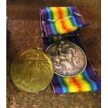 A 1914-18 War medal for PTE.E.A.H. Pettitt and a Peace medal