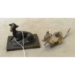 A small bronze model of a lamb and a brass mouse ornament