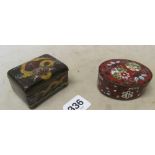 A cloisonné box black ground decorated dragon and another iron red ground decorated flowers