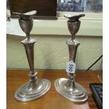 A pair of silver candlesticks