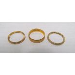 Three 22ct gold bands 2.9gms, 2gms and 3.3gms